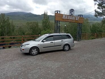 Ford Focus: 2000 г., 1.8 л, Механика, Газ, Универсал