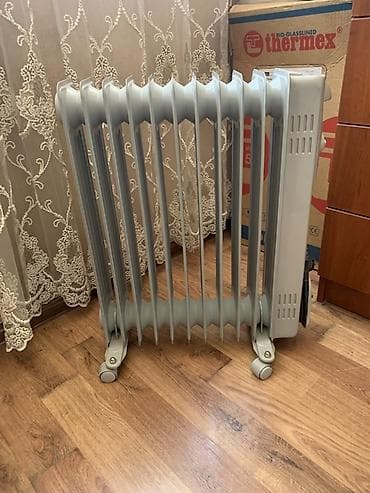 not: Масляный обогреватель Кол-во секций: 10 и более, Встроенный вентилятор — 1