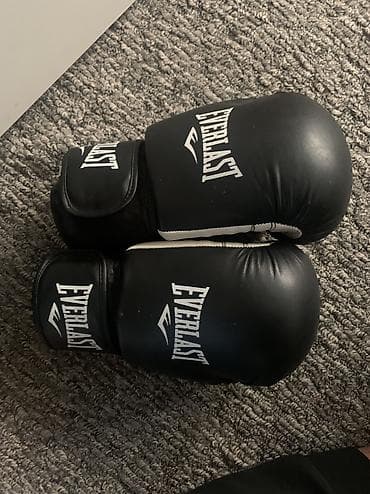 баксорский перчатки: Боксерские перчатки Everlast, черные (10-OZ) - Классическая форма и — 3