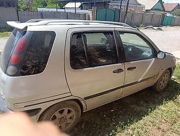 Транспорт: Toyota Raum: 1998 г., 1.5 л, Автомат, Бензин, Минивэн — 2
