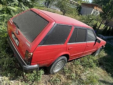 g comp: Nissan Bluebird: 1986 г., 1.8 л, Механика, Бензин, Универсал — 6