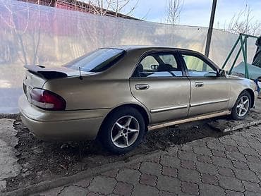 80 b4: Mazda 626: 1998 г., 2 л, Механика, Бензин, Седан — 3