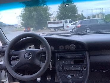 diska 13: Audi 100: 1993 г., Седан — 2