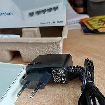 Модемы и сетевое оборудование: TP-Link TL-SF1005D — настольный неуправляемый коммутатор на 5 портов — 2