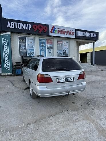 spark premier: Nissan Primera: 2002 г., 2 л, Механика, Бензин, Универсал — 5
