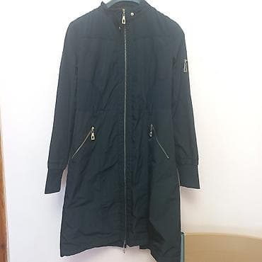 пуховое пальто женское: Женское зимнее пальто-пуховик,черного цвета. Особенности: - Теплый — 7