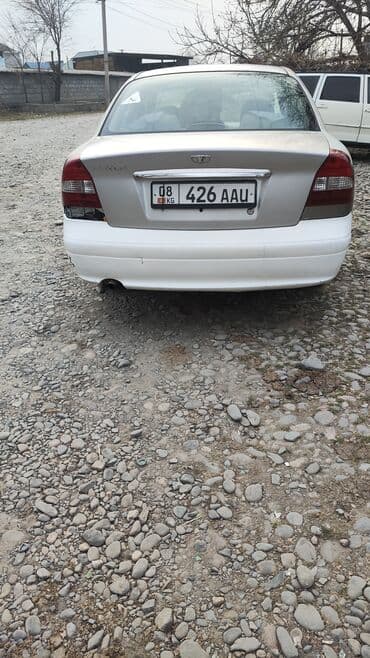 купить зимние шины на 14 бу: Daewoo Nubira: 1998 г., 1.5 л, Автомат, Бензиновая, Седан — 3