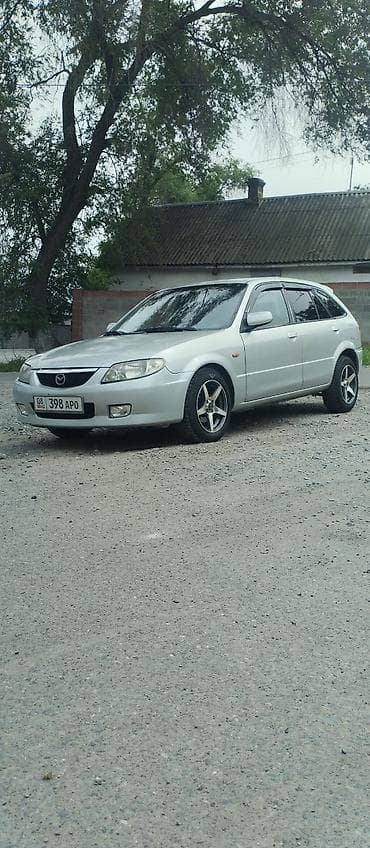 авто мазда: Mazda 323: 2001 г., 1.6 л, Механика, Газ, Универсал — 4
