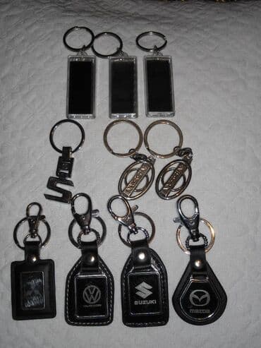 1. Верхний ряд мигающие AUDI=20 сом. Второй ряд NISSAN=50 сом