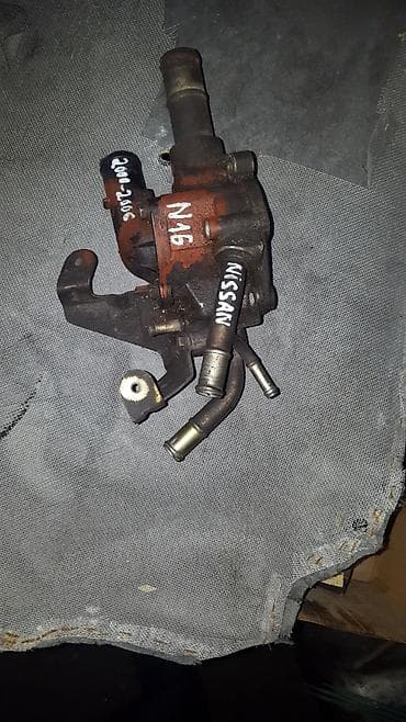 almera: Nissan Almera 2006 год подушка двигателя термостата корпус термостата — 1