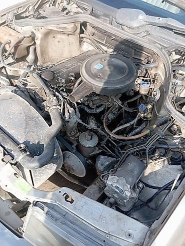 глушитель на бус: Mercedes-Benz W124: 1987 г., Седан — 7