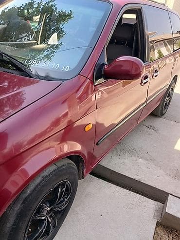 корейские минивэны: Kia Carnival: 2000 г., Минивэн — 2