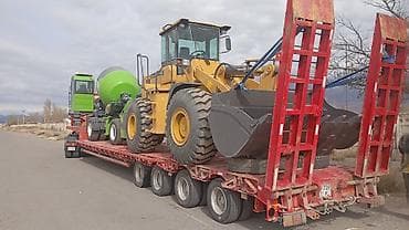 Негабаритные и тяжеловесные автоперевозки спецтехники на низкорамных