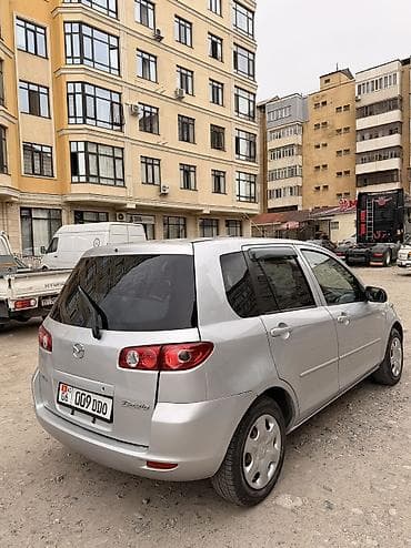 нексе: Mazda Demio: 2003 г., 1.3 л, Автомат, Бензин, Лифтбек — 5