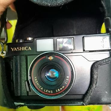 Пленочный фотоаппарат Yashica с кожаным футляром - Тип: компактная — 5