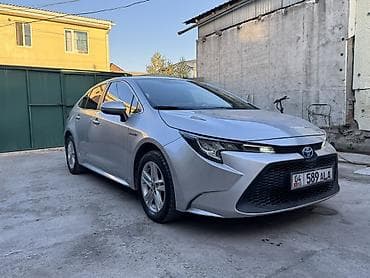 Toyota Corolla: 2020 г., 1.8 л, Автомат, Гибрид, Седан
