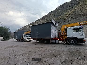Услуги манипулятора (кран-борта) на базе грузовика MAN. - Перевозка и