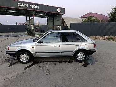 уаз hunter: Mazda 323: 1985 г., 1.5 л, Механика, Бензин, Хэтчбэк — 2