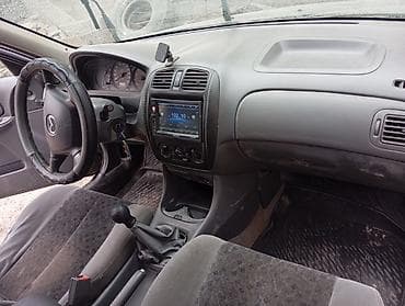 mazda d: Mazda 323: 2001 г., 1.6 л, Механика, Бензин, Седан — 9