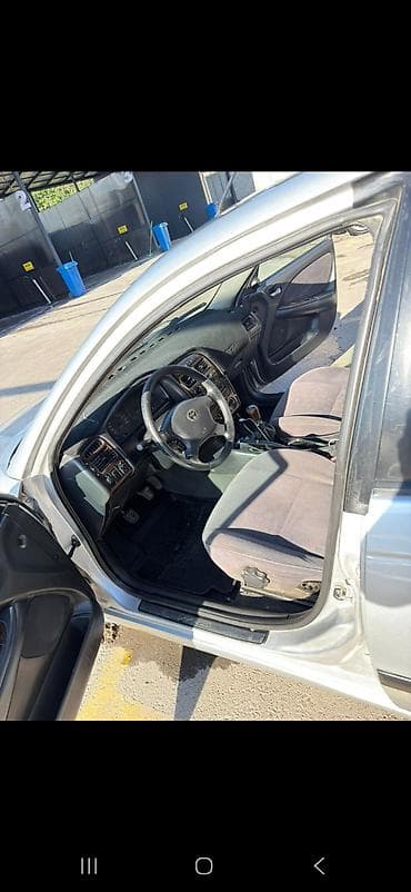 man tg: Toyota Avensis: 2001 г., Механика, Седан — 8