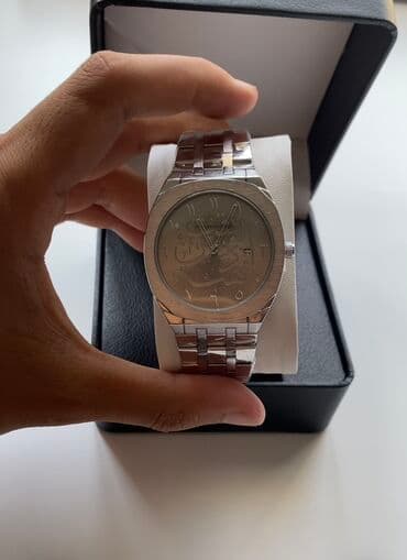 купить золотые часы бу: Элегантные наручные часы в стальном исполнении - Корпус и браслет — 2