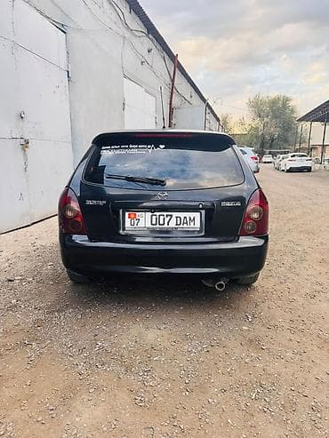 bcd com kg: Mazda 323: 2002 г., 1.6 л, Автомат, Бензин, Хэтчбэк — 3