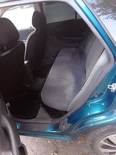 mazda 121: Mazda 323: 1999 г., 1.5 л, Ручные, Бензин, Хэтчбэк — 2