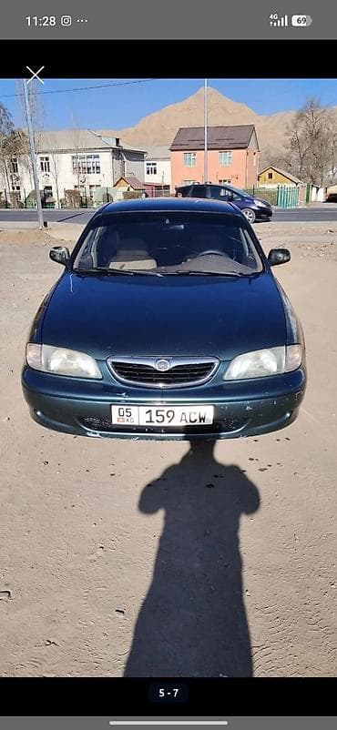 Mazda Capella: 1999 г., Седан