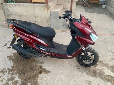 электронные мотоцикл: Скутер макси-класса, красный металлик. Особенности: - Агрессивный — 4