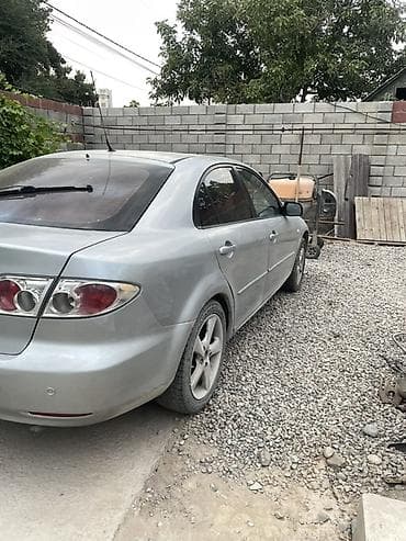 howo 2025: Mazda 6: 2001 г., Седан — 2