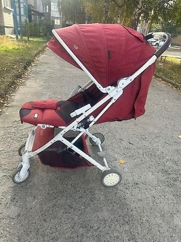 коляска stokke: Прогулочная коляска-трость (компактная) в бордовом цвете — 1