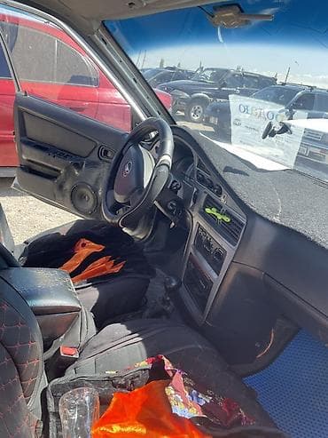 жигули богажник: Седан серебристого цвета. Основные характеристики: - Кузов: 4‑дверный — 6