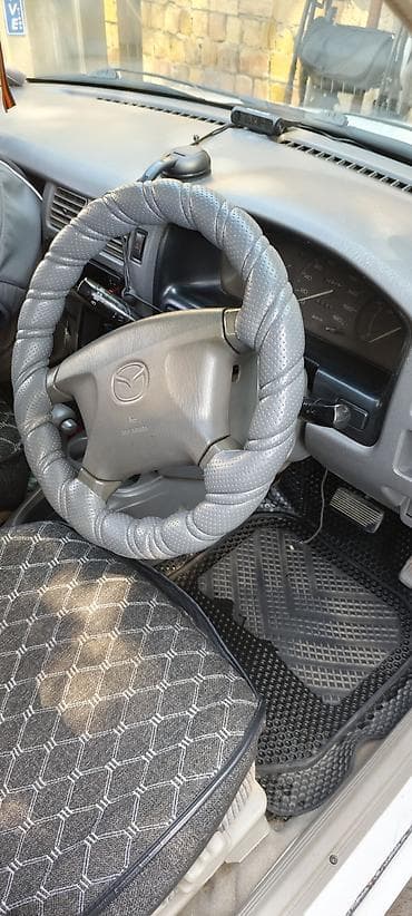 mini copper: Mazda Demio: 1998 г., 1.3 л, Автомат, Бензин, Универсал — 10
