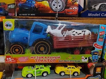 Игрушки: Музыкальный трактор с прицепом и фигурками животных - Яркий синий — 1