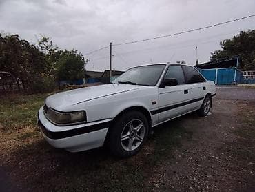Транспорт: Mazda 626: 1989 г., 2 л, Механика, Газ, Седан — 7