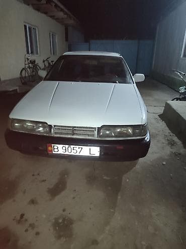 молдинг 124: Mazda 626: 1989 г., Механика, Седан — 1