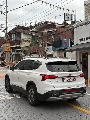 byd e7: Hyundai Santa Fe: 2021 г., 1.6 л, Автомат, Гибрид, Кроссовер — 5