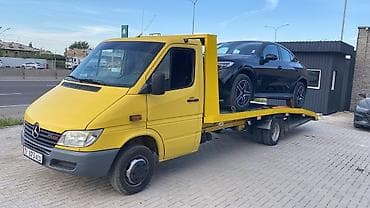 водитель токмок: С лебедкой, С манипулятором, Со сдвижной платформой — 1