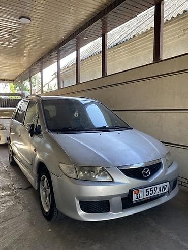 дверные карты на е34: Mazda PREMACY: 2003 г., 2 л, Механика, Бензин, Минивэн — 1