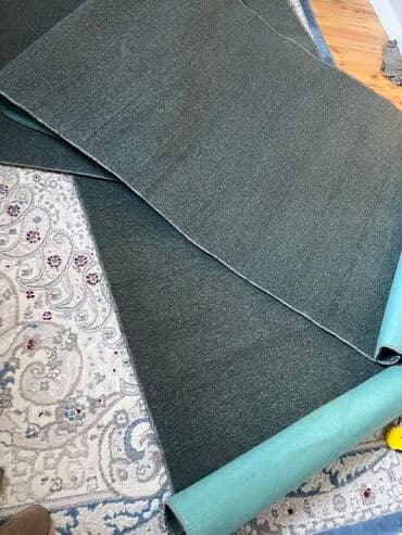 рассрочка ковров: Ковровое покрытие (ковролин) темно‑серо‑зеленого цвета. 2 ковролина — 3
