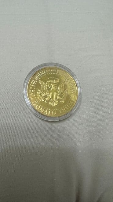 драгоценные монеты рубли: Монета 45-й президент США
Дональд Трамп — 2