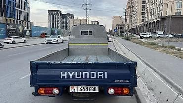 монитор портер 2: Hyundai Porter II, компактный бортовой грузовик в синем цвете — 7
