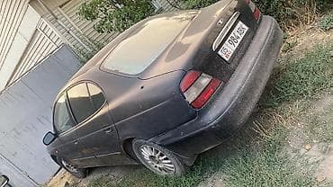 Транспорт: Daewoo Leganza: 1999 г., 1.8 л, Автомат, Бензин, Седан — 7