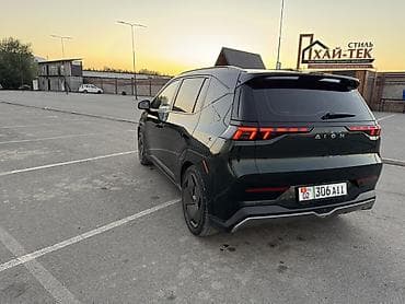 GAC: Электромобиль Aion (GAC) — компактный городской хэтчбек с ярким — 4