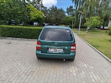 консоль 124: Mazda Demio: 2000 г., 1.3 л, Механика, Хэтчбэк — 1