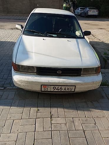 малибо: Mazda 323: 1997 г., Механика, Седан — 3