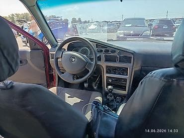 левый: Daewoo Nexia: 2011 г., 1.5 л, Механика, Бензин, Седан — 5