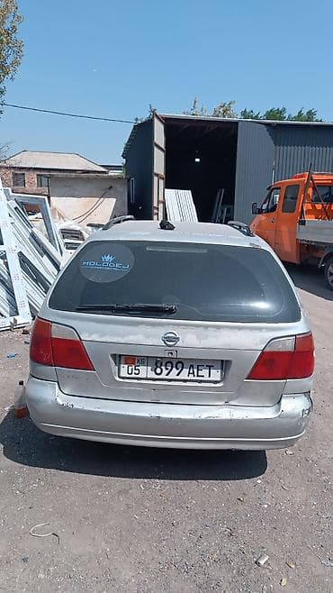 Nissan Primera: 2001 г., 1.8 л, Кол менен иштөөчү, Бензин, Универсал — 4