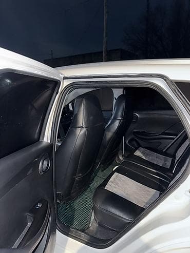 э 2: BYD E2: 2024 г., 0.1 л, Робот, Электромобиль, Кроссовер — 7
