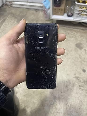 телефон 9: Samsung Galaxy A8 2018, Б/у, цвет - Черный, 1 SIM — 2